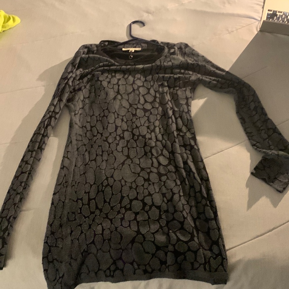 Rhinestone patterned sweater with inner lining size large but fits snugly